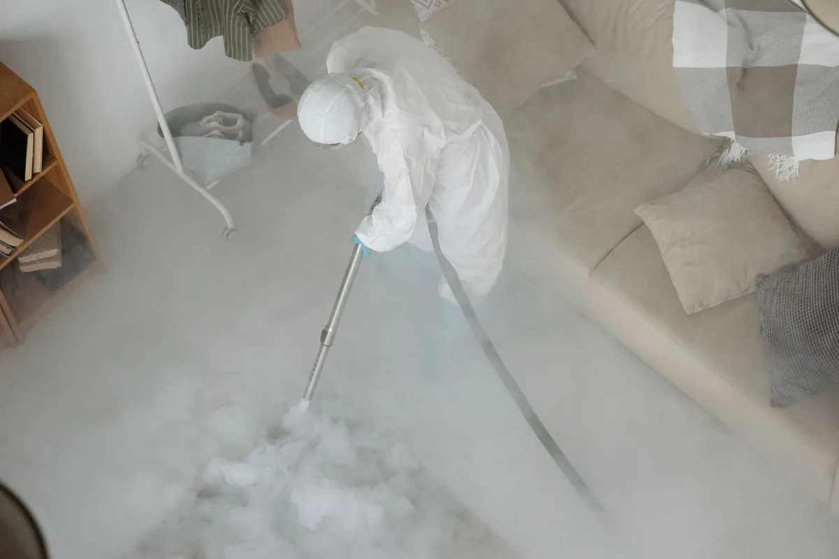 Biohazard cleanup technician in protective equipment, Decatur, MS